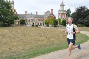 Runners in the Great Yarmouth Half Marathon running past Somerleyton Hall